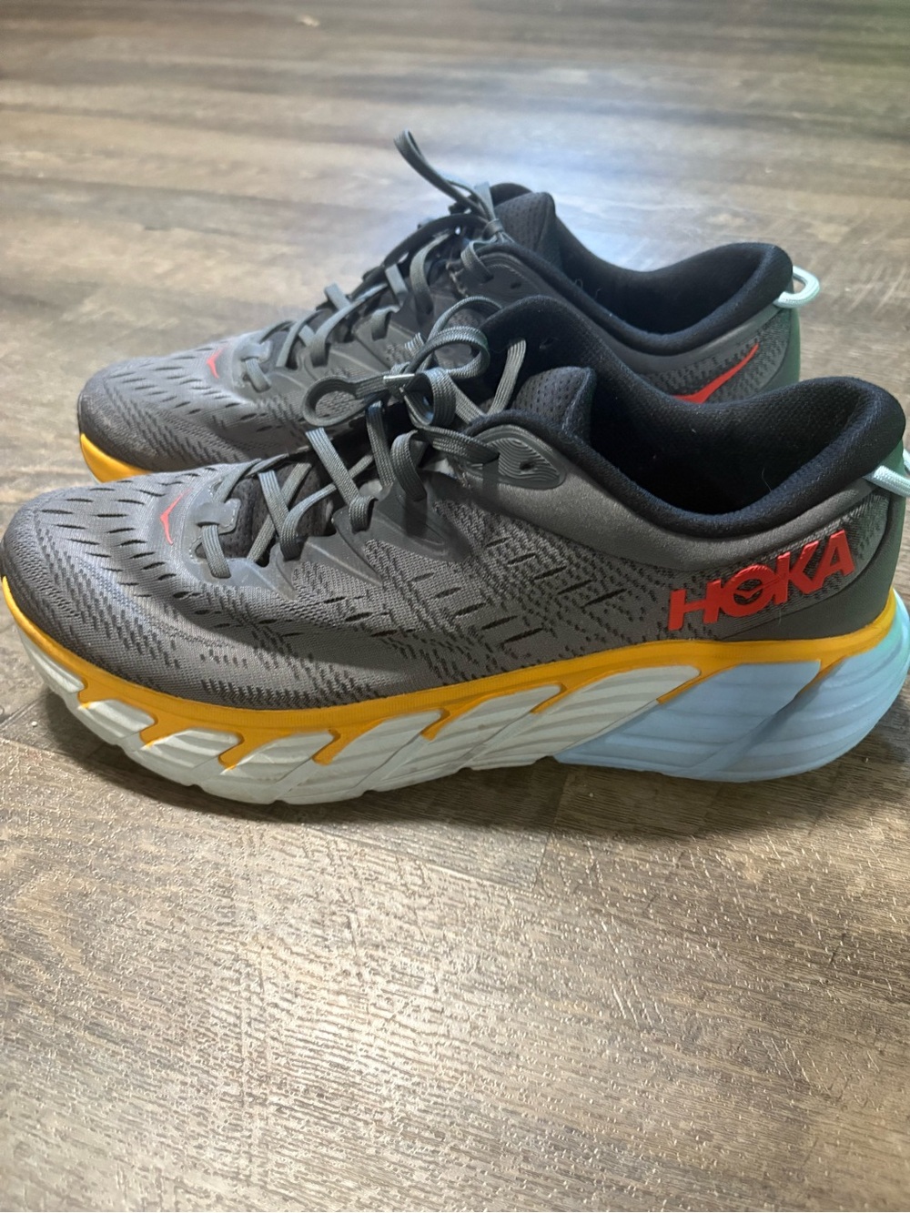 Hoka Gray Running Shoes with Yellow Midsole and Light Blue Outsole